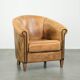 Vintage sheepskin club armchair in a light cognac colour