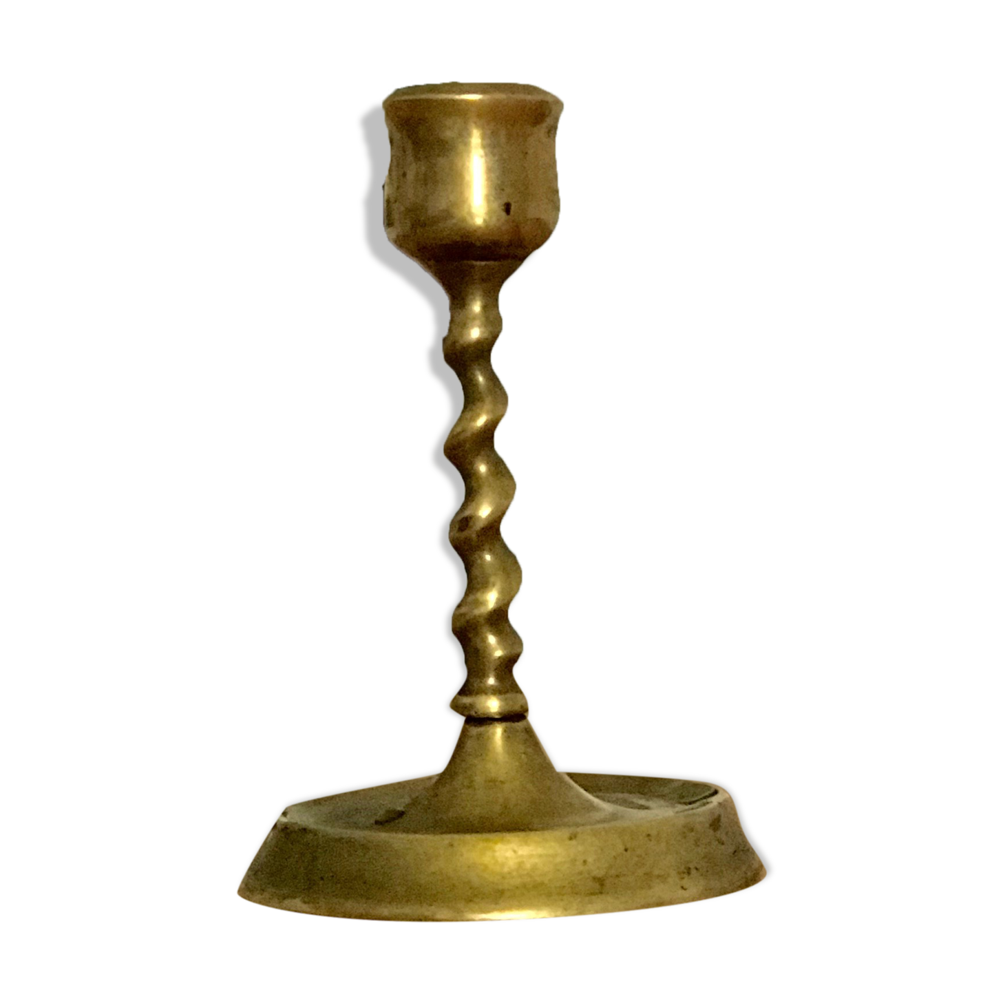 Twisted brass candle holder