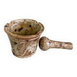 Pyrite sandstone mortar and its pestle