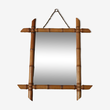 Vintage bamboo wooden mirror with retro bohemian spirit