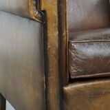 Sheepskin leather armchair with character and a touch of Art Deco design