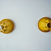 Pair of "cocoon" wall lights, pear shape, resin and pine, Italy, 1970