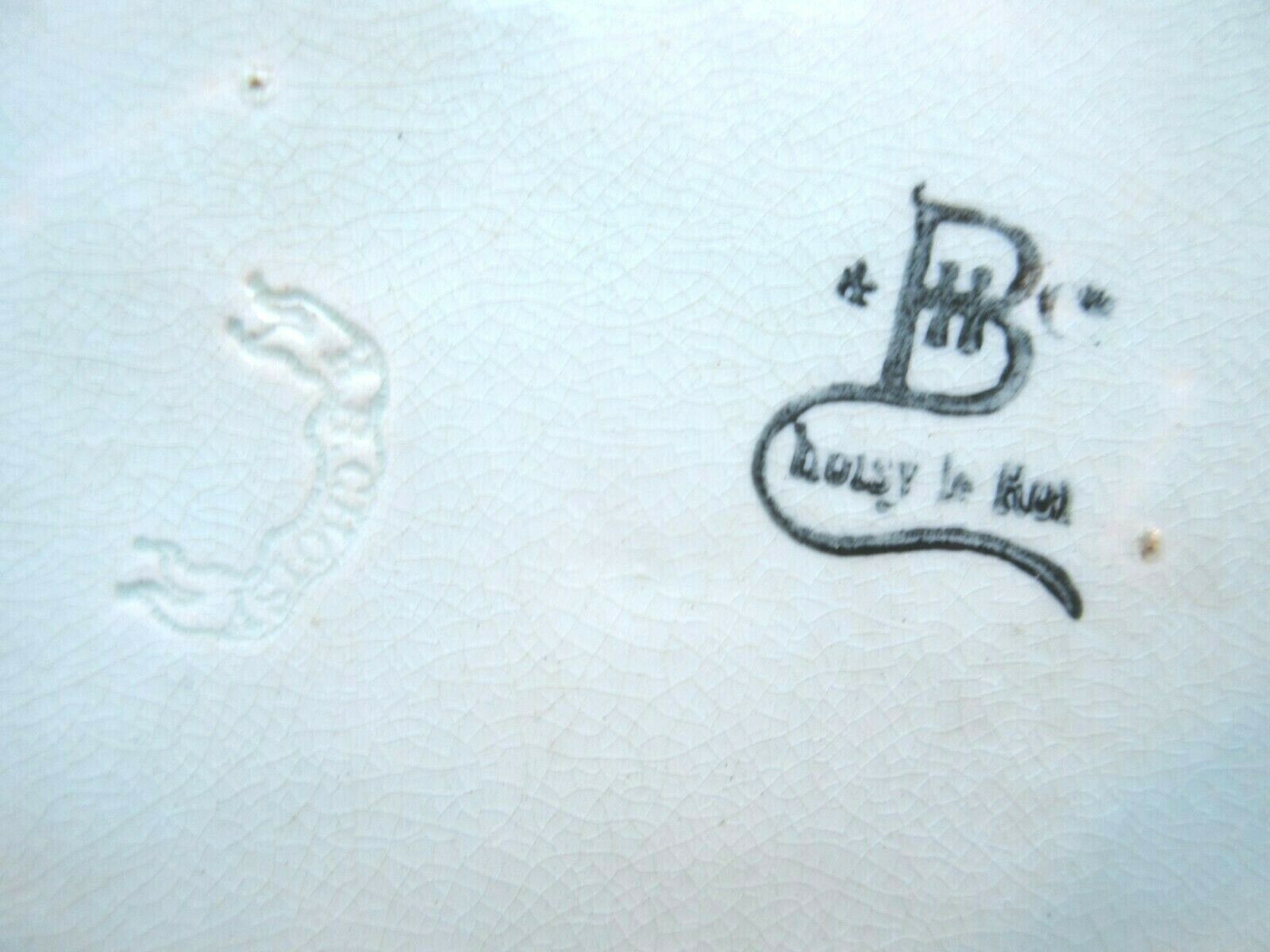 Slurry plate Choisy le Roi: Leaves and flowers bound by a ribbon