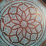 Old oriental tray in chiseled copper