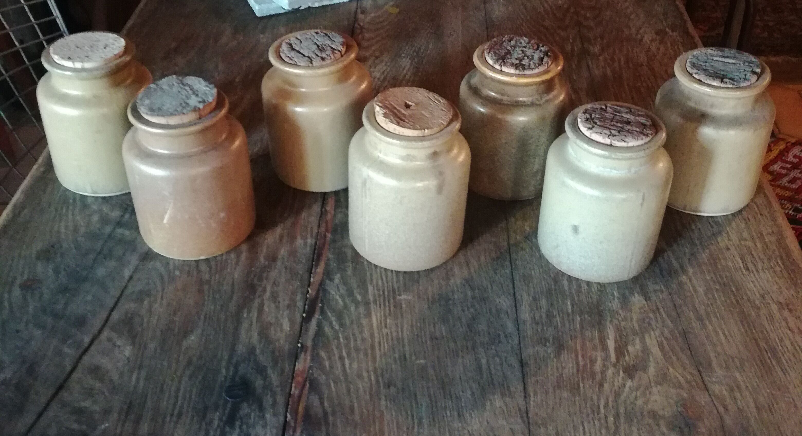 Lot of seven sandstone spice pots
