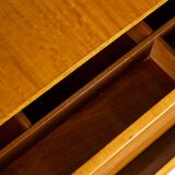 Chest of drawers in varnished blond cherry wood. 1960s.