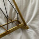 Vintage wall coat rack in gilded metal
