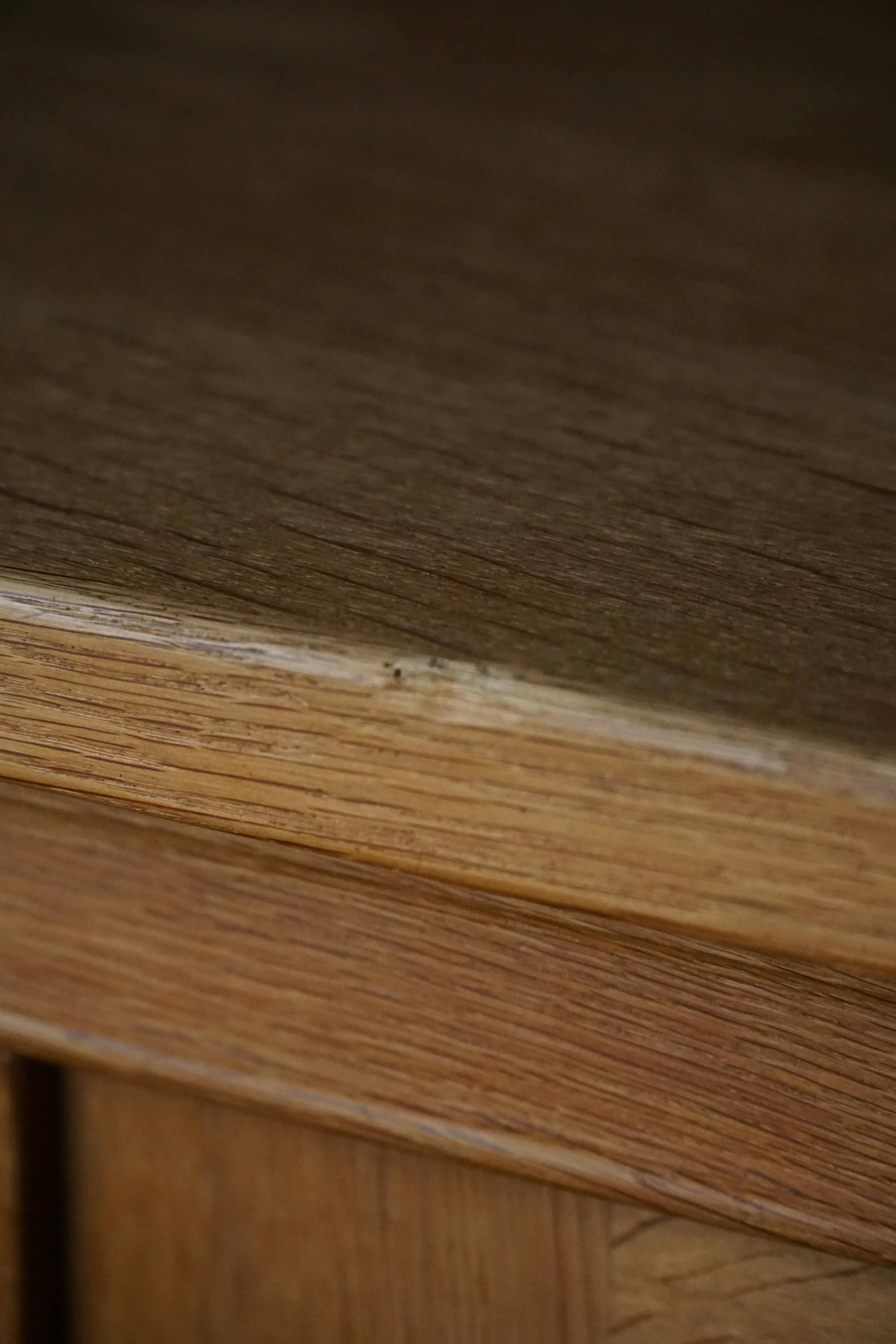 Henning Kjærnulf, enfilade in oak, mid-century Danish, Nyrup Møbelfabrik, 1960s.