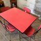 Table et 4 chaises en Formica rouge