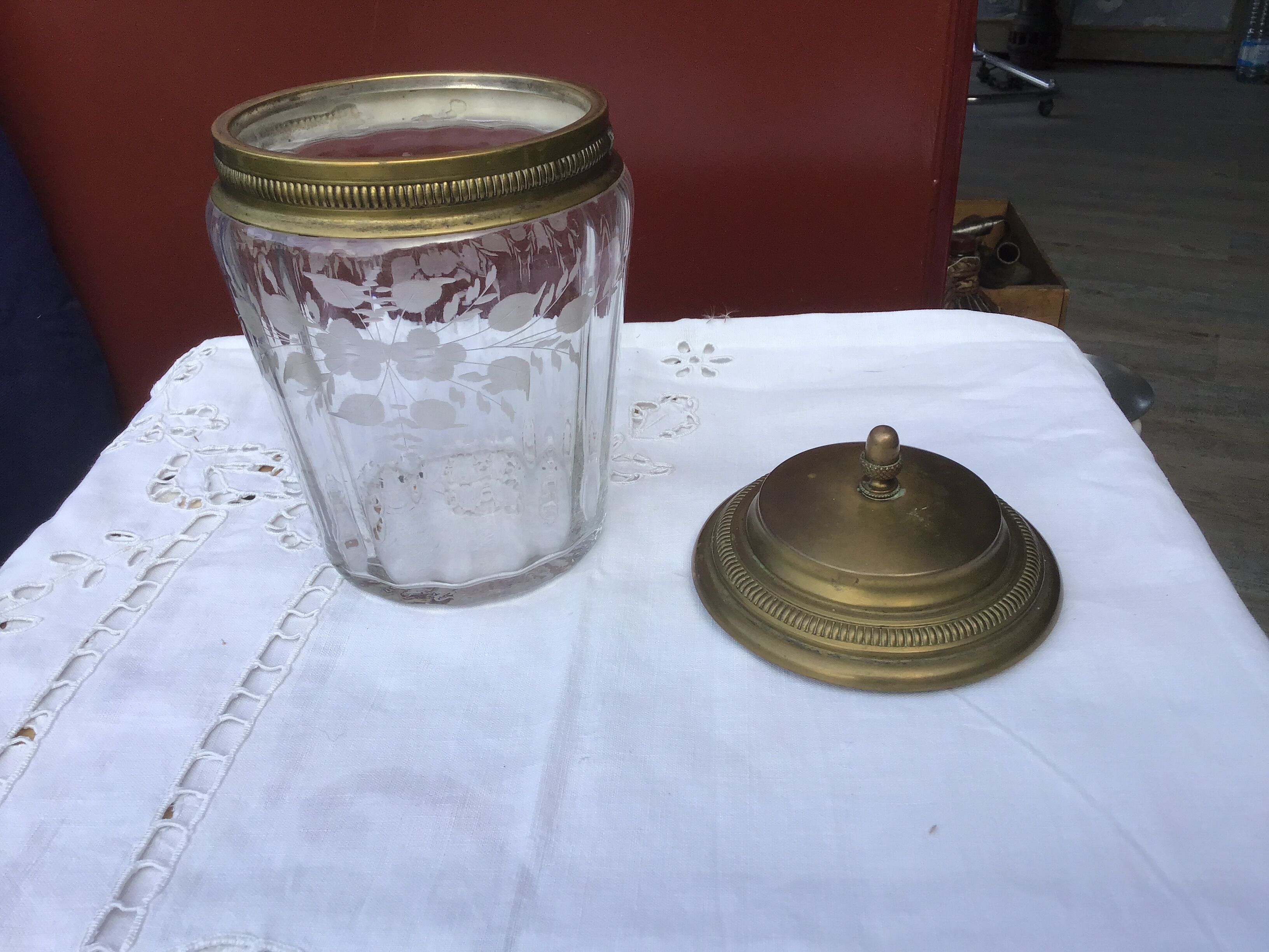 Glass cookie jar engraved metal frame brass