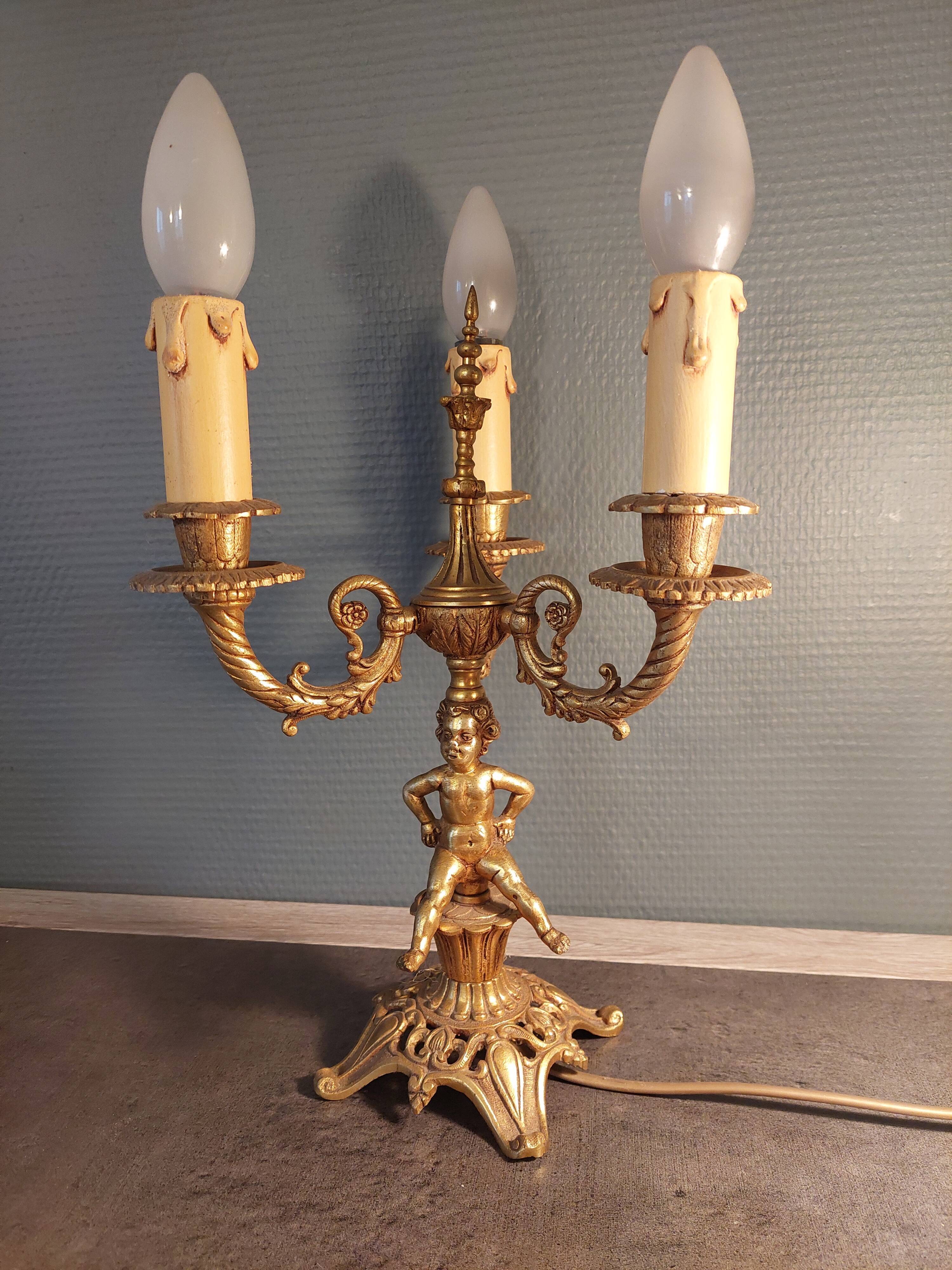 Electrified three-spoke brass candlesticks