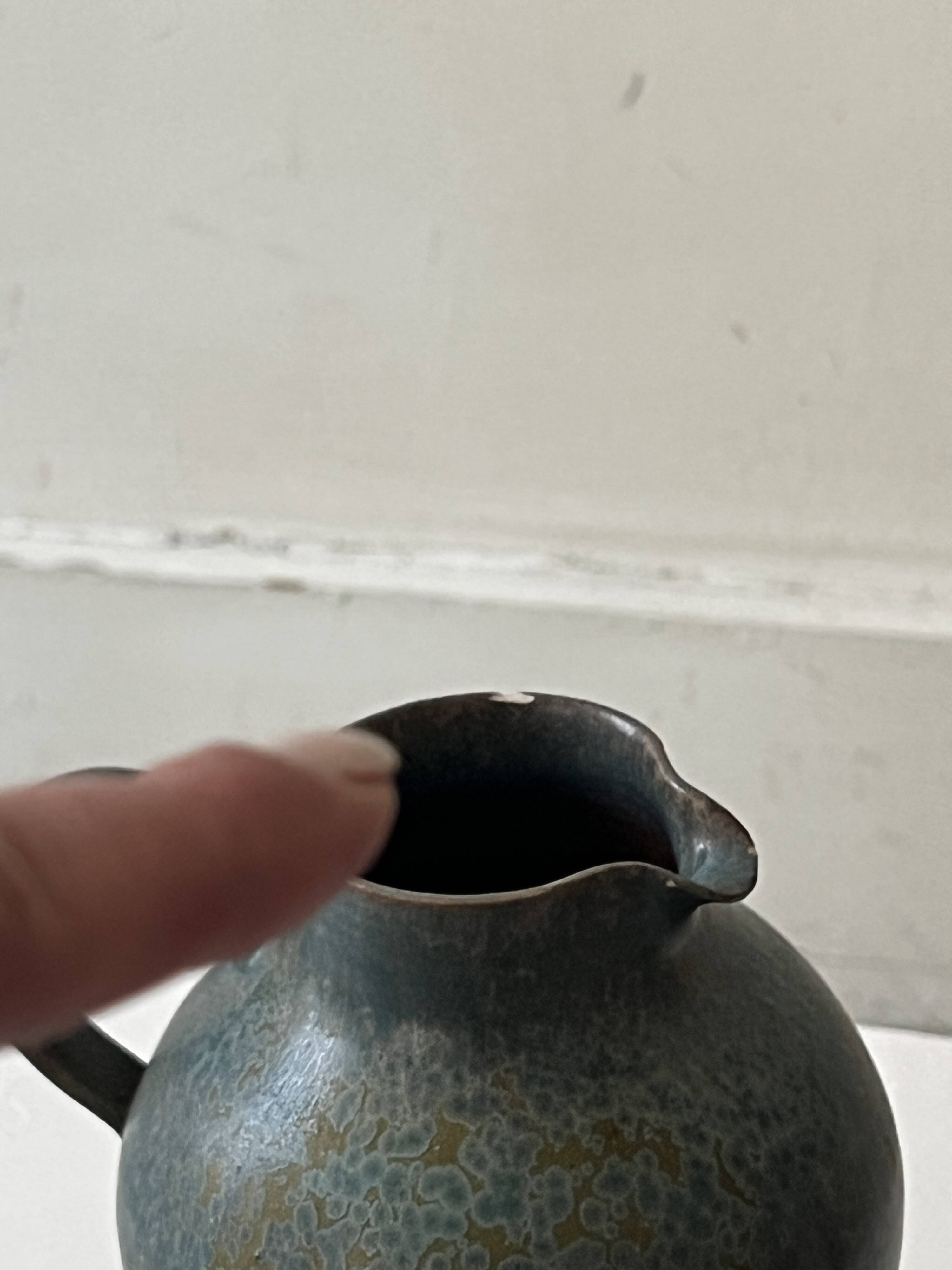 Brownish blue ceramic vase signed AH, France 1950.