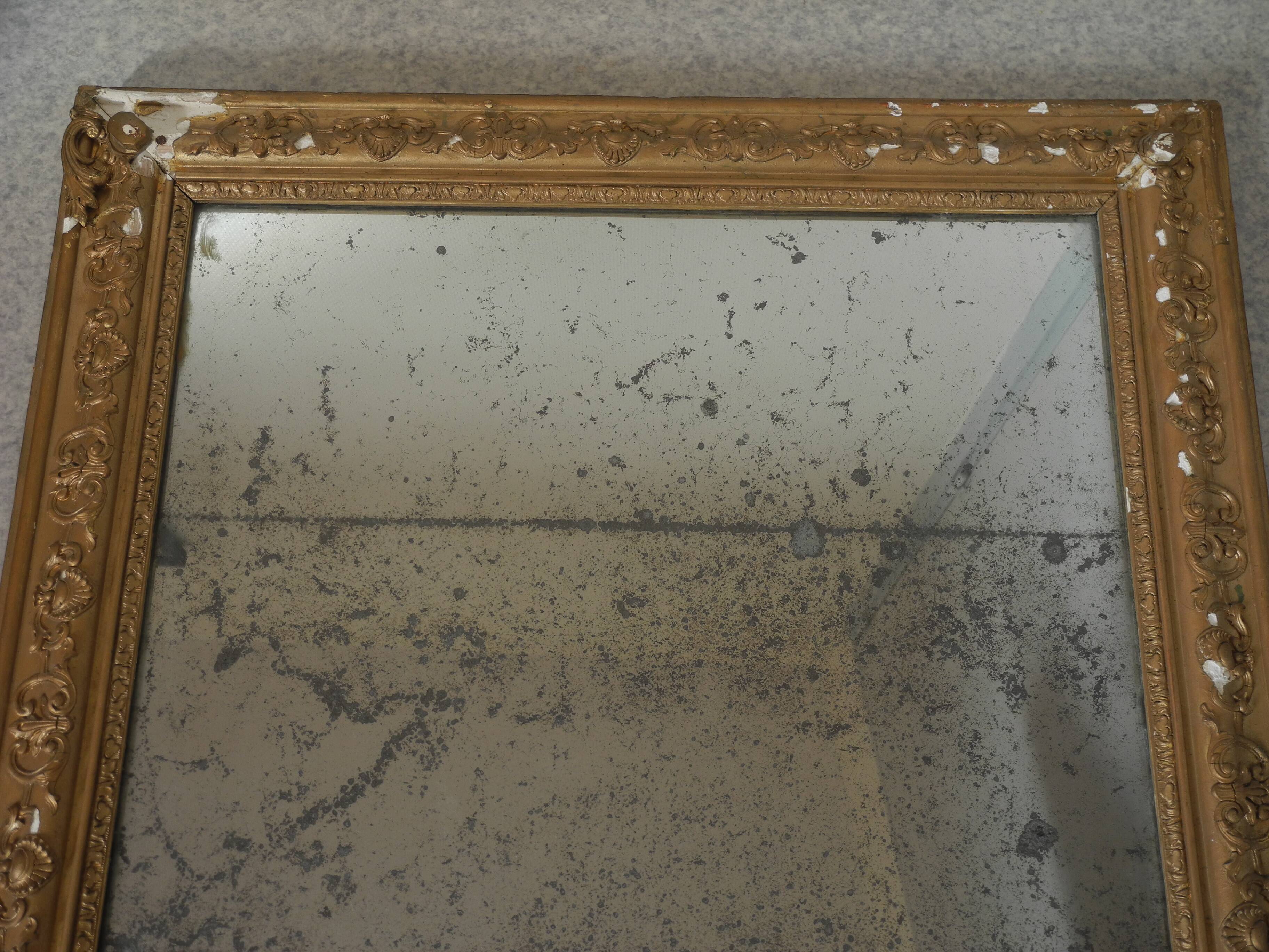 antique mercury mirror with gilded wood and stucco from the 19th century