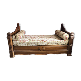 Louis Philippe period boat bed in mahogany veneer on original casters