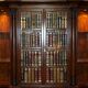 Bibliothèque Theodore Alexander en faux livres en laurier burl