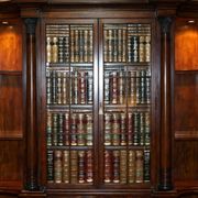 Theodore Alexander library in faux books in burl laurel.
