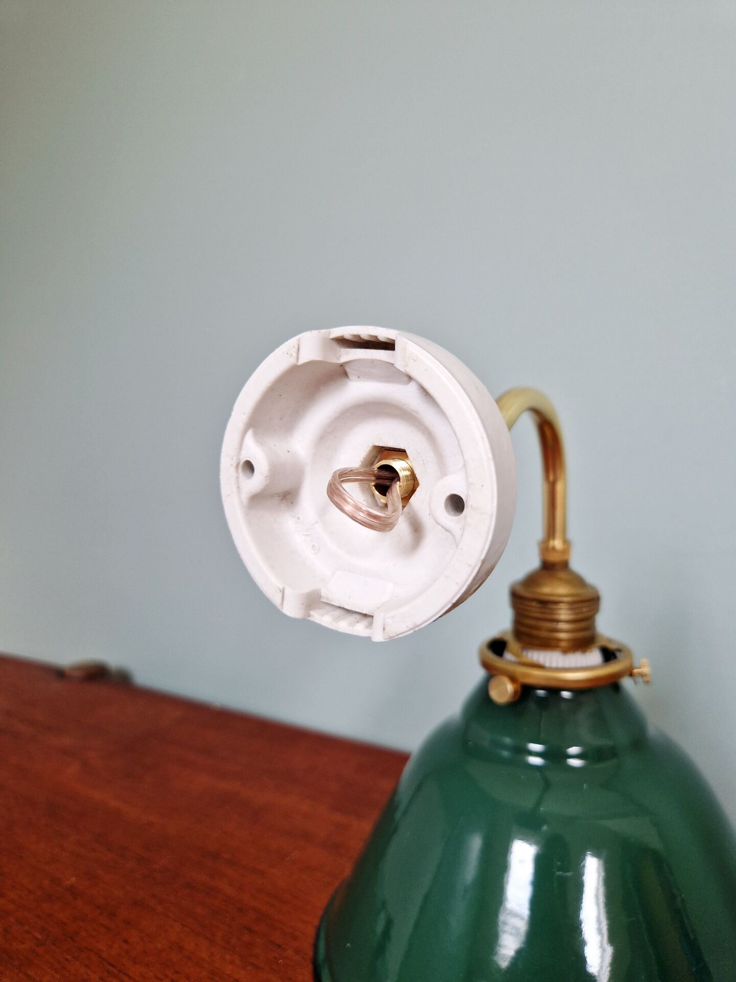 Brass wall light with green enamelled sheet metal, Mid-Century