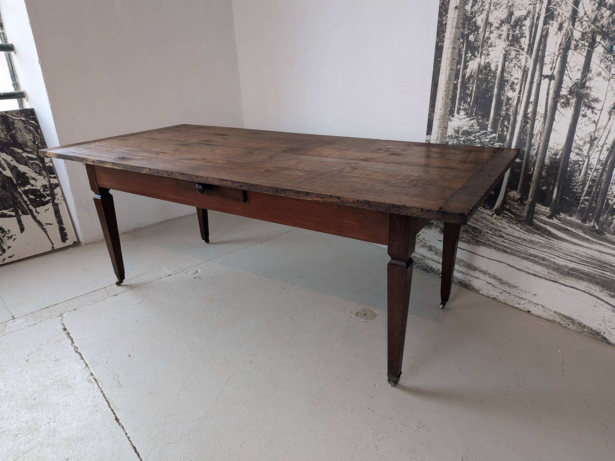 Campaign table in solid oak, Directoire style.