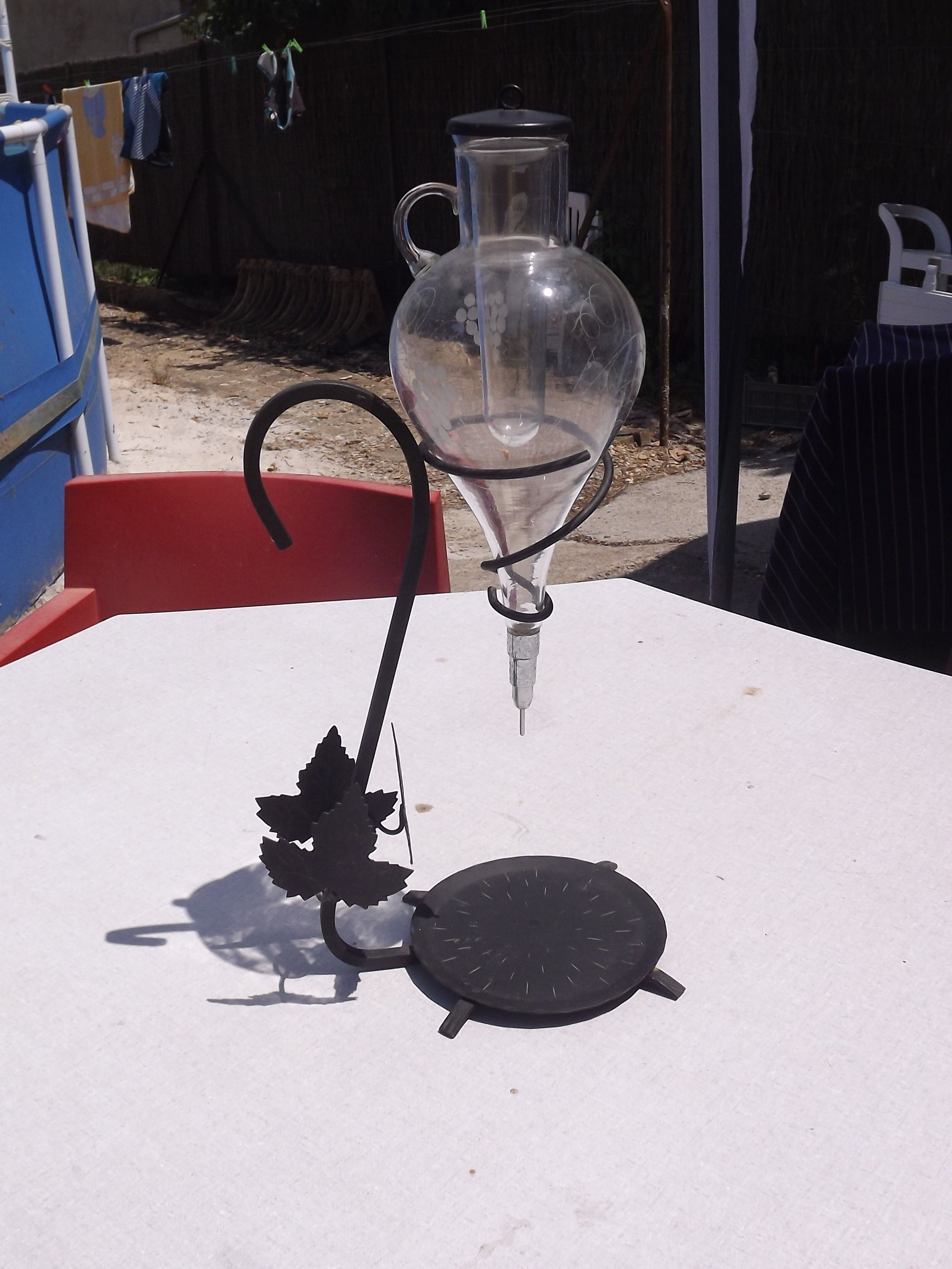 Iron and glass wine decanter