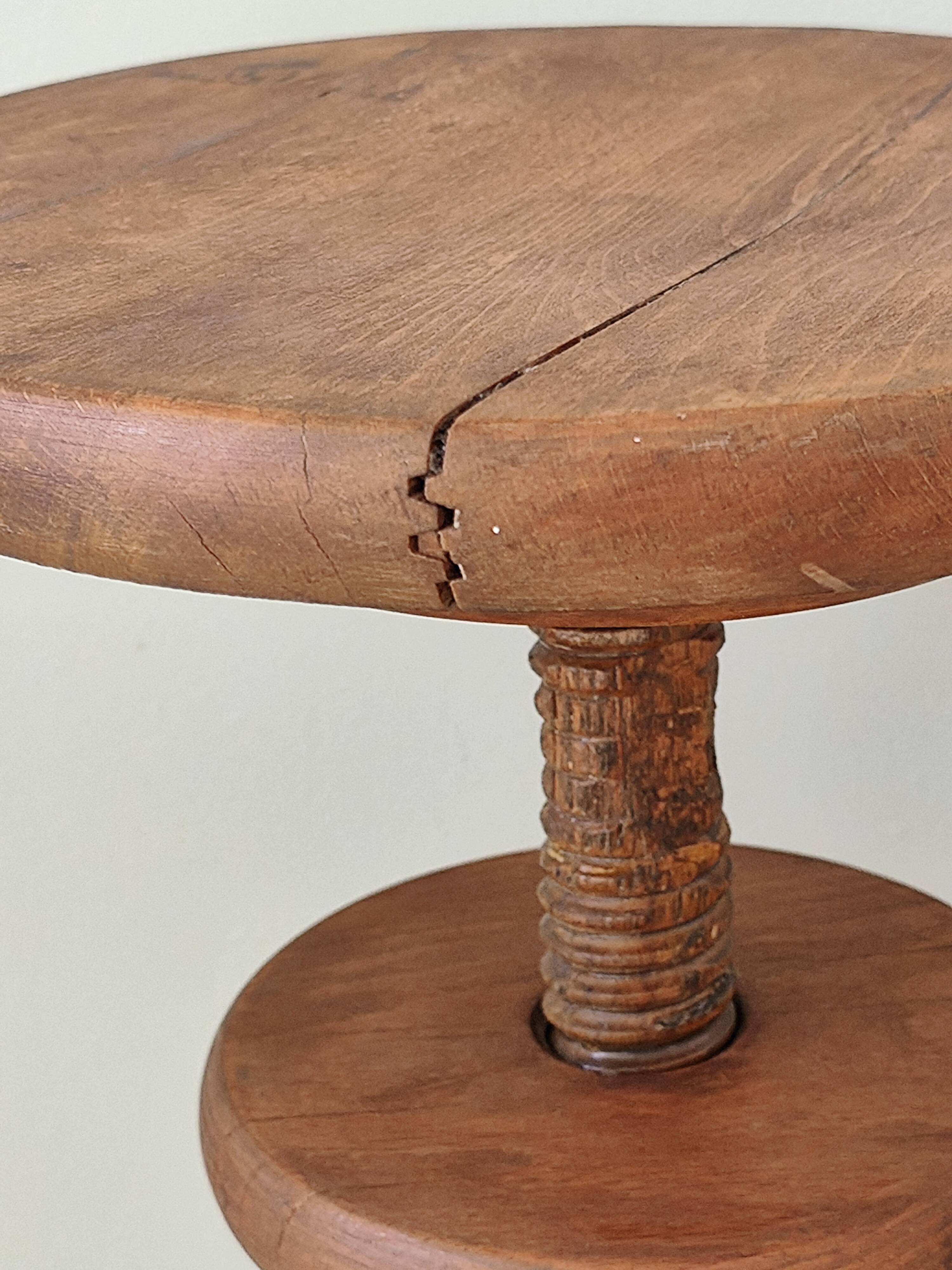 Adjustable vintage workshop stool made of solid wood