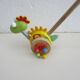 Push toy, wooden dinosaur. Brand: Bino