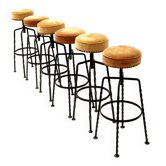 Set of six cast iron bar stools from the 1970s.