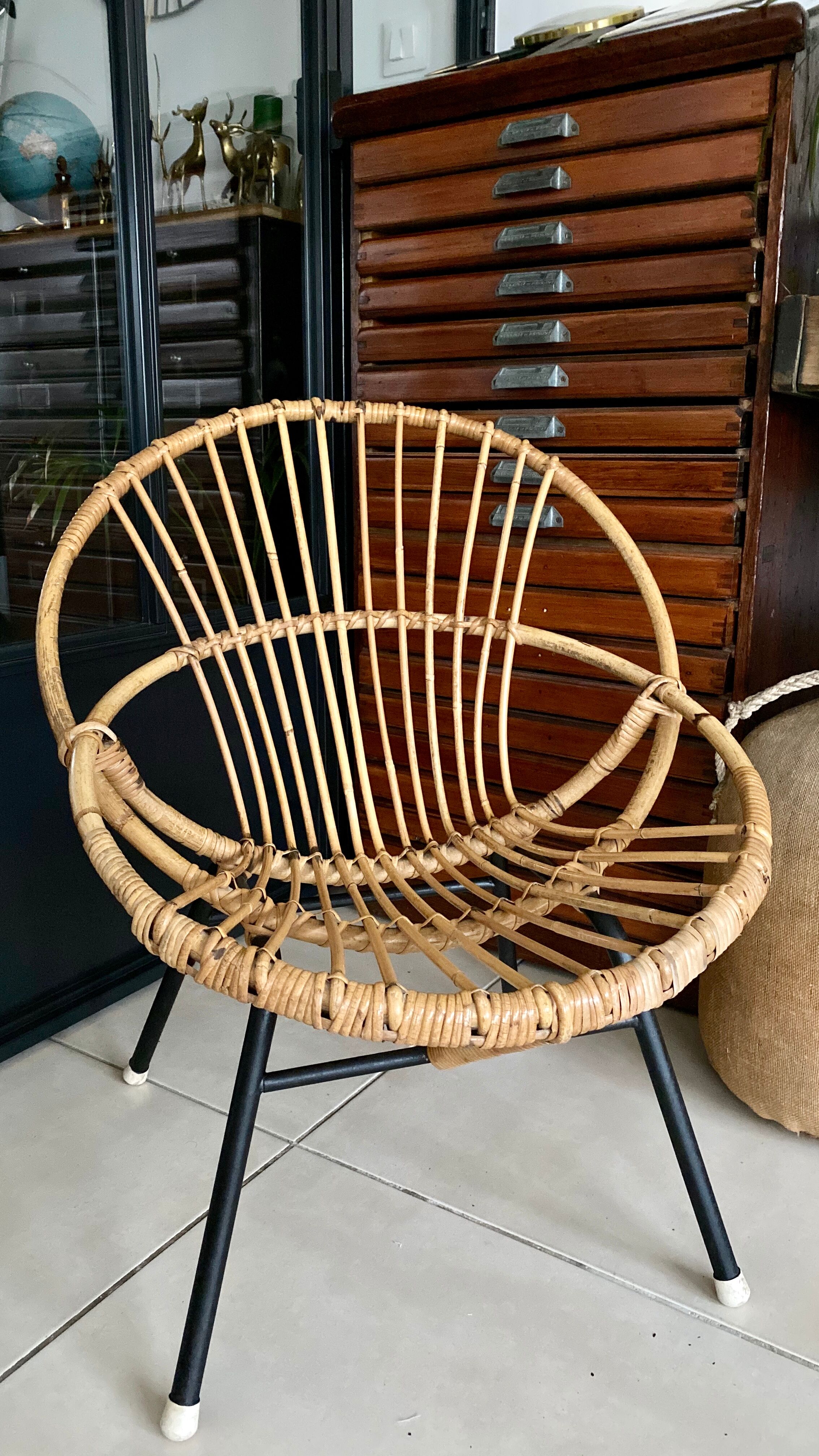 Old vintage metal foot rattan chair