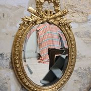 Miroir ovale doré, XIXe siècle