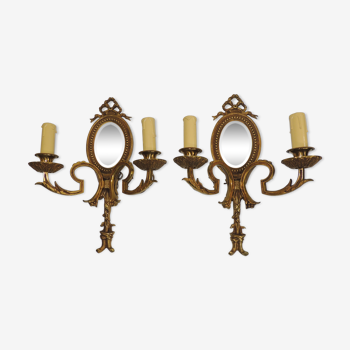 Paire d'appliques en bronze style Louis XVI