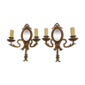 Pair of Louis XVI style bronze wall lamps
