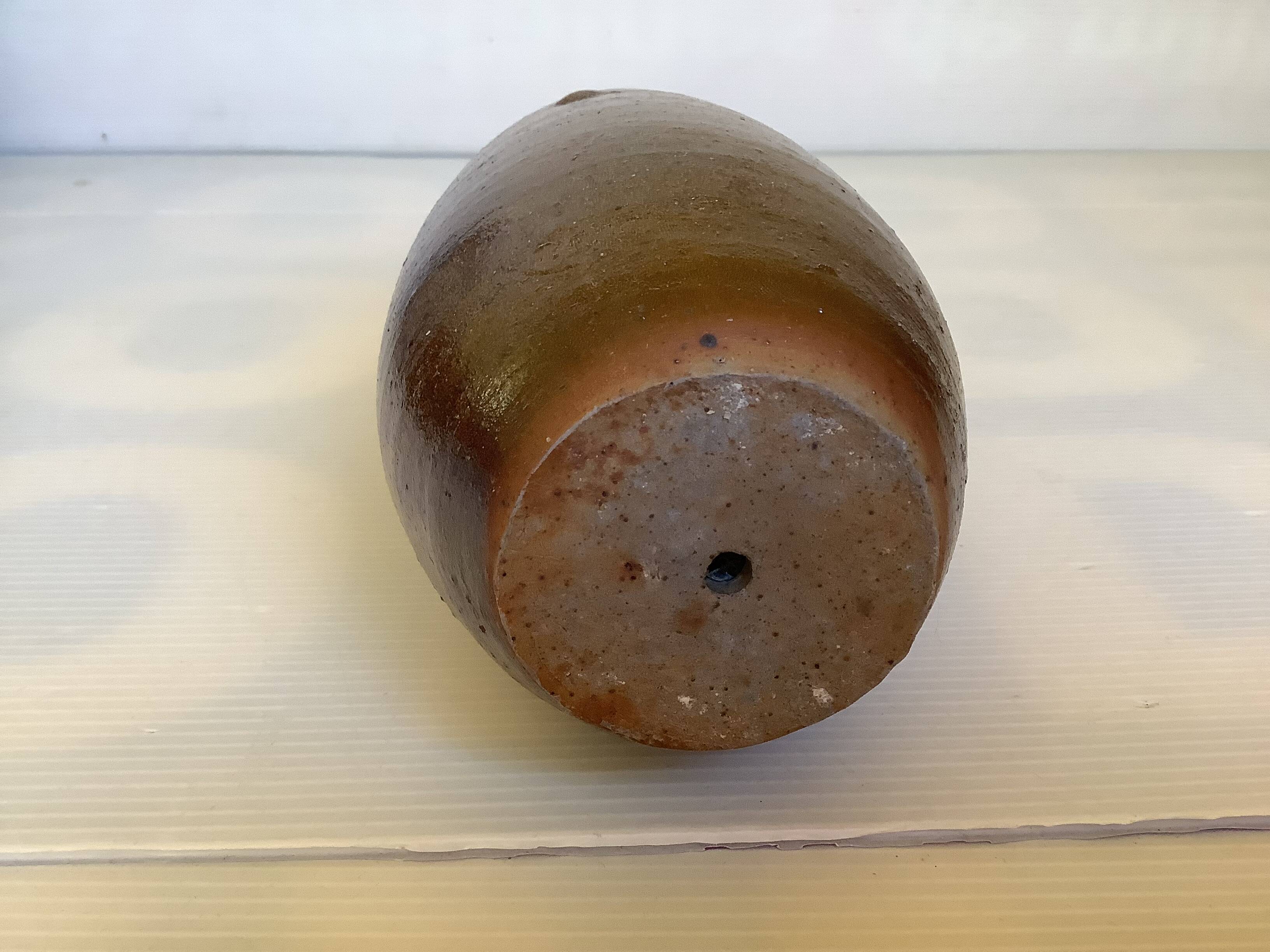 Brown stoneware bottle