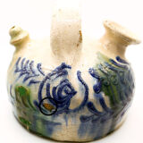 Rustic gurel with floral motifs