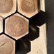 Set of 5 hexagonal bicolour suar stools forming accent furniture.