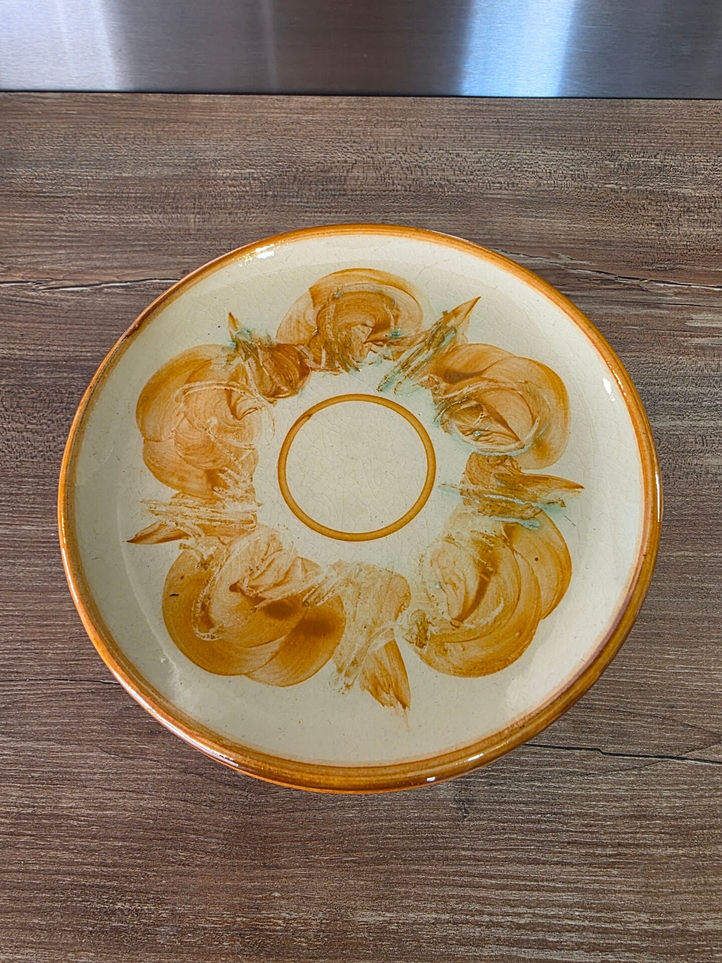 8 vintage dessert plates with a signed decoration.