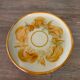 8 vintage dessert plates with a signed decoration.