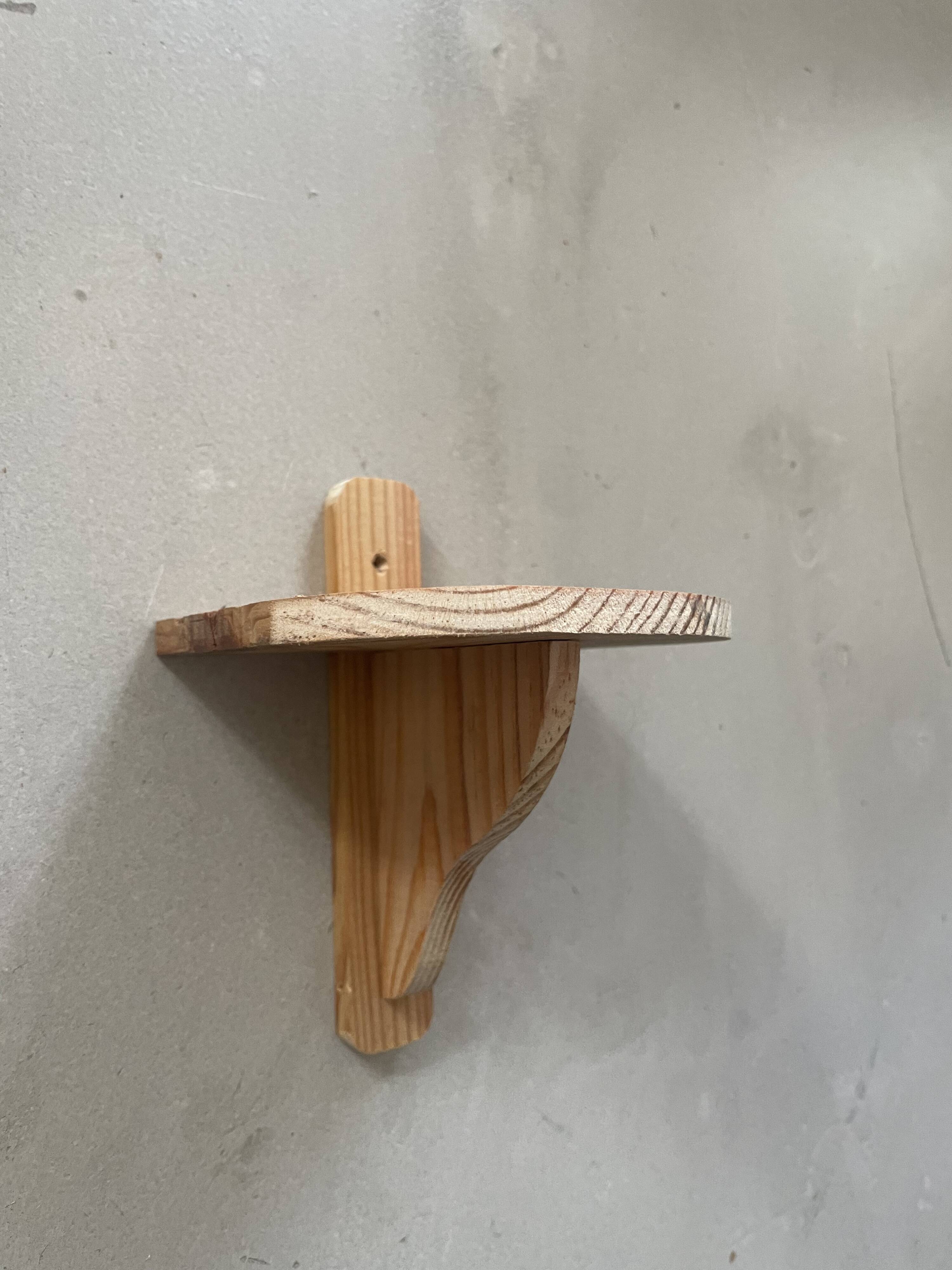 Small wooden wall shelf