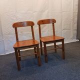 pair of solid pine chairs by Rainer Daumiller