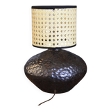 Stoneware lamp with cane shade