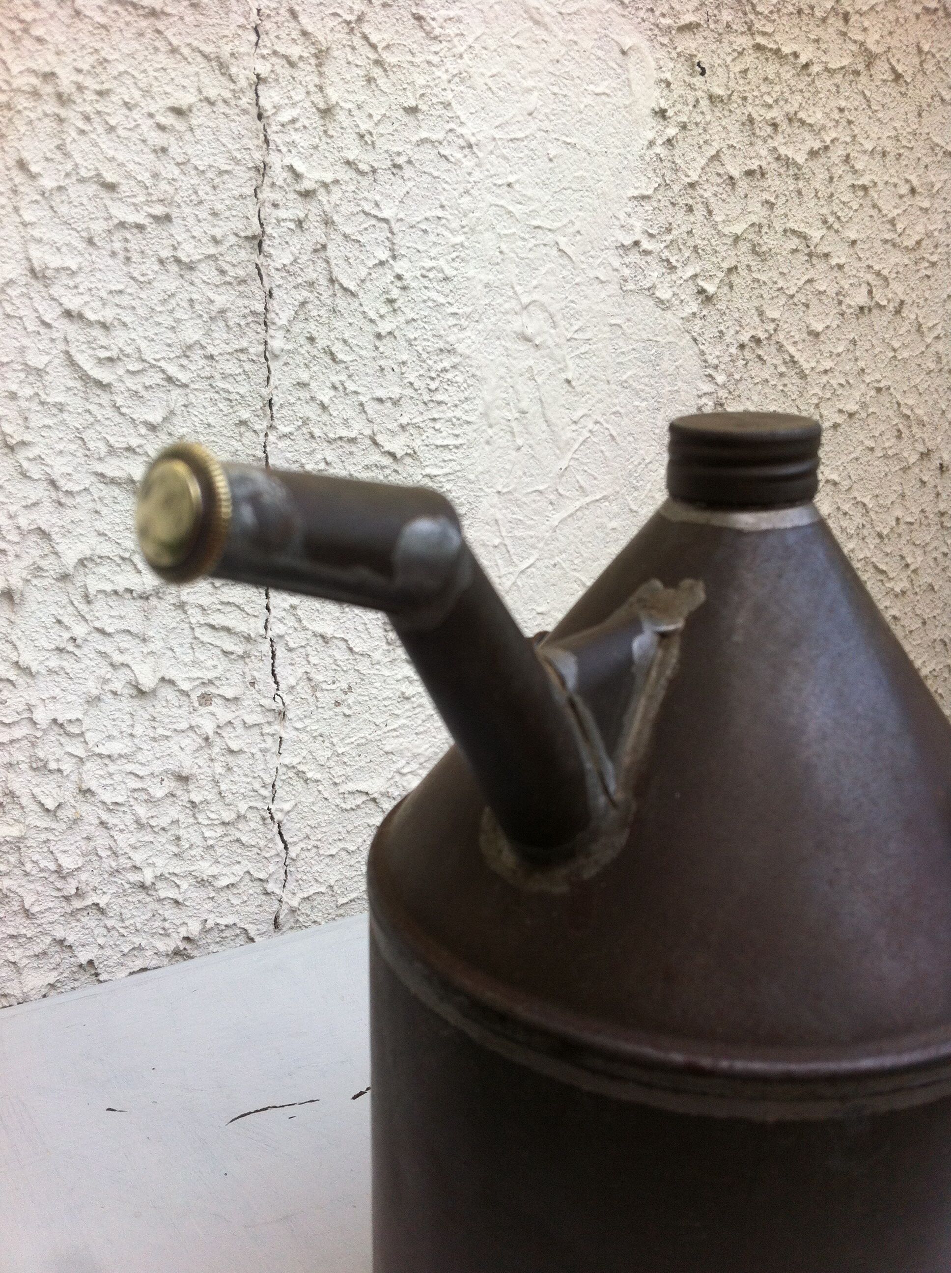 Old watering can