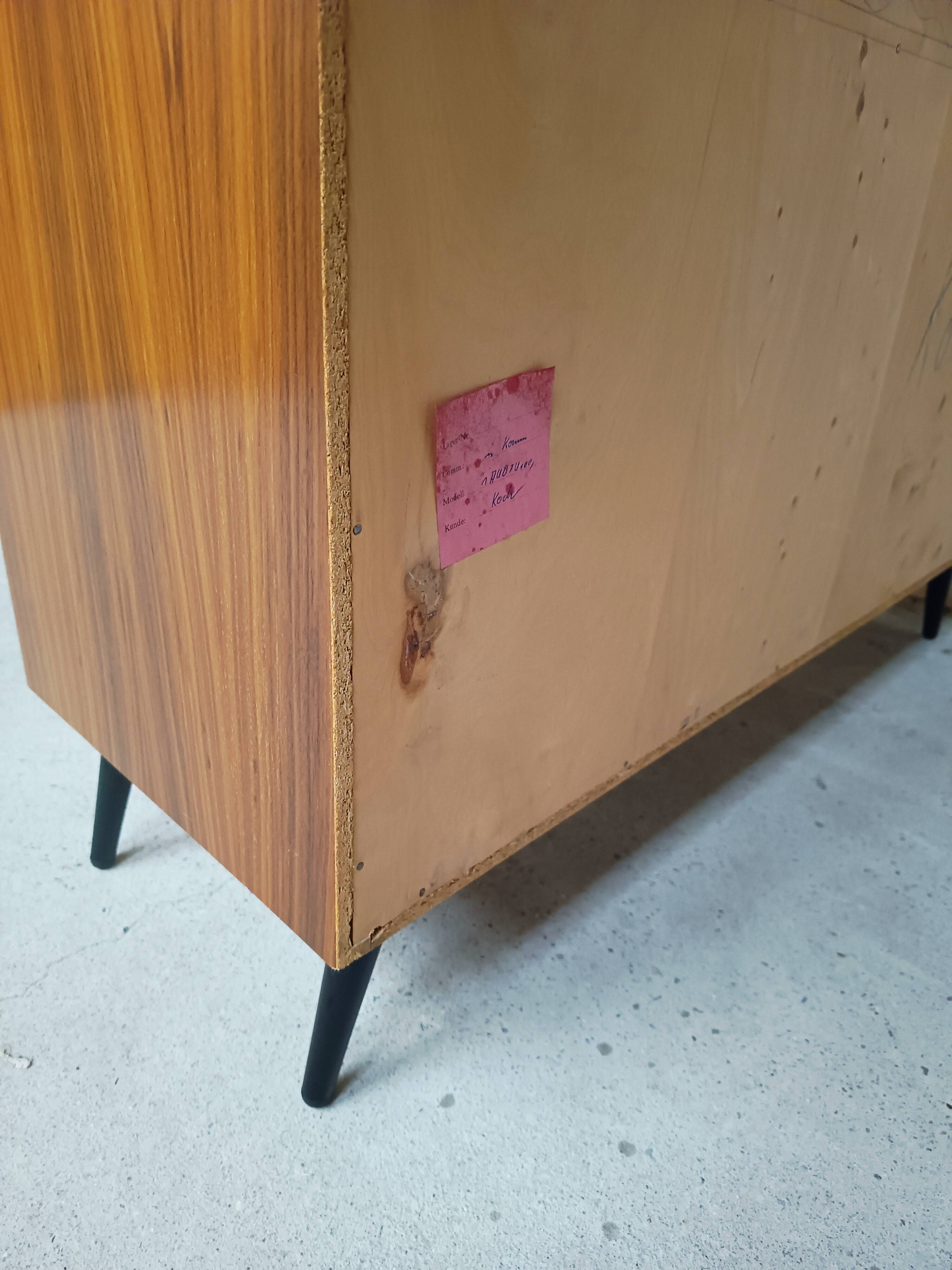 Semi-open, two-door cabinet, 1960