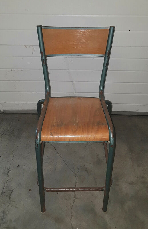 Old science school chair in tube