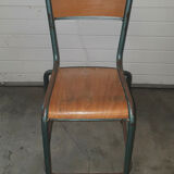 Old science school chair in tube