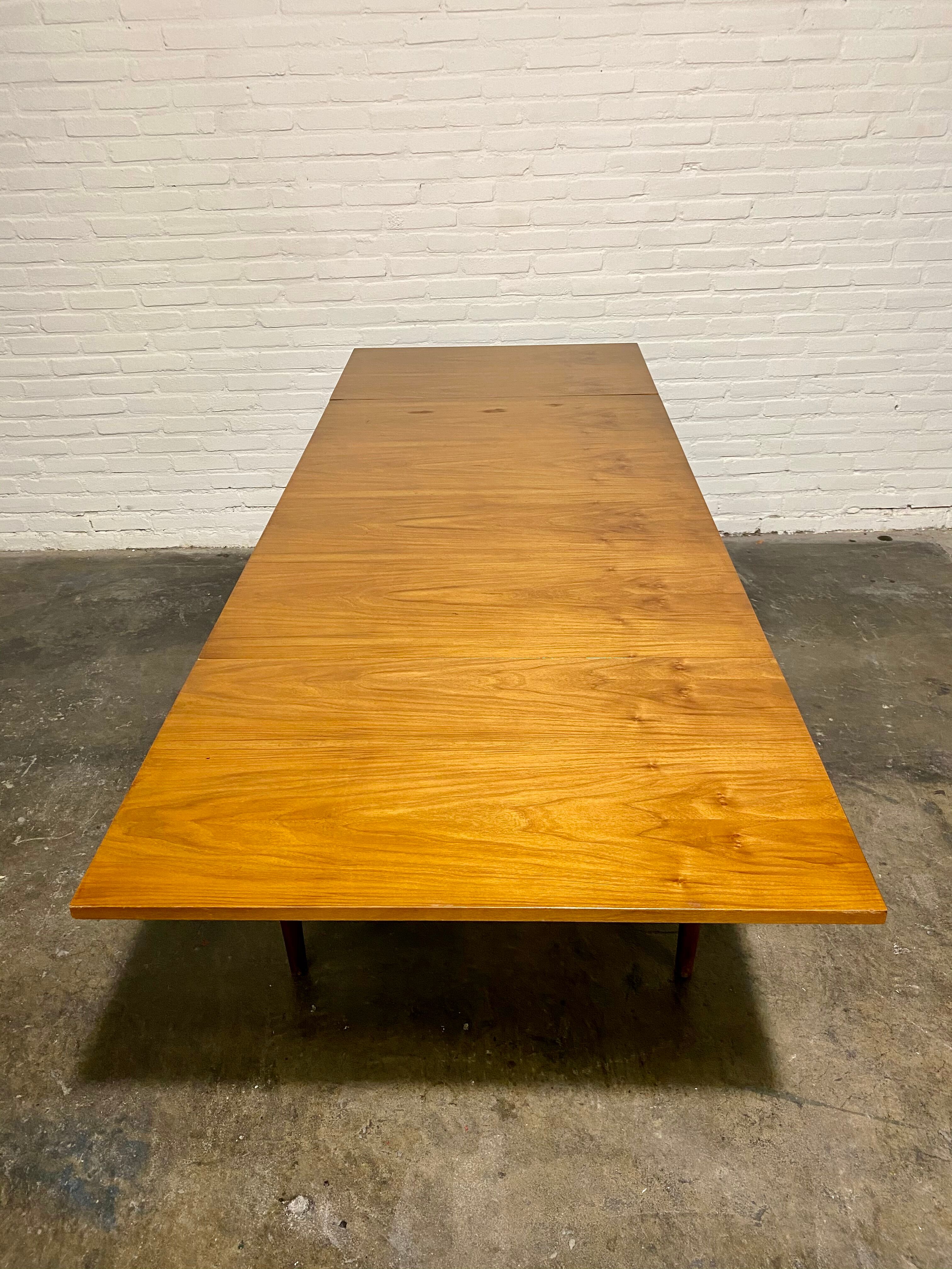 Vintage teak square extendable  dining table designed and manufactured by lübke,  1960s