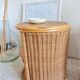 Pair of wicker bedside tables circa the 1970s.