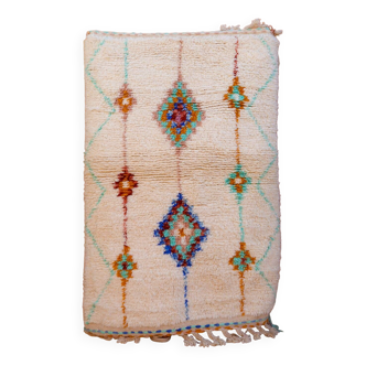 White Moroccan azilal rug with pastel color patterns