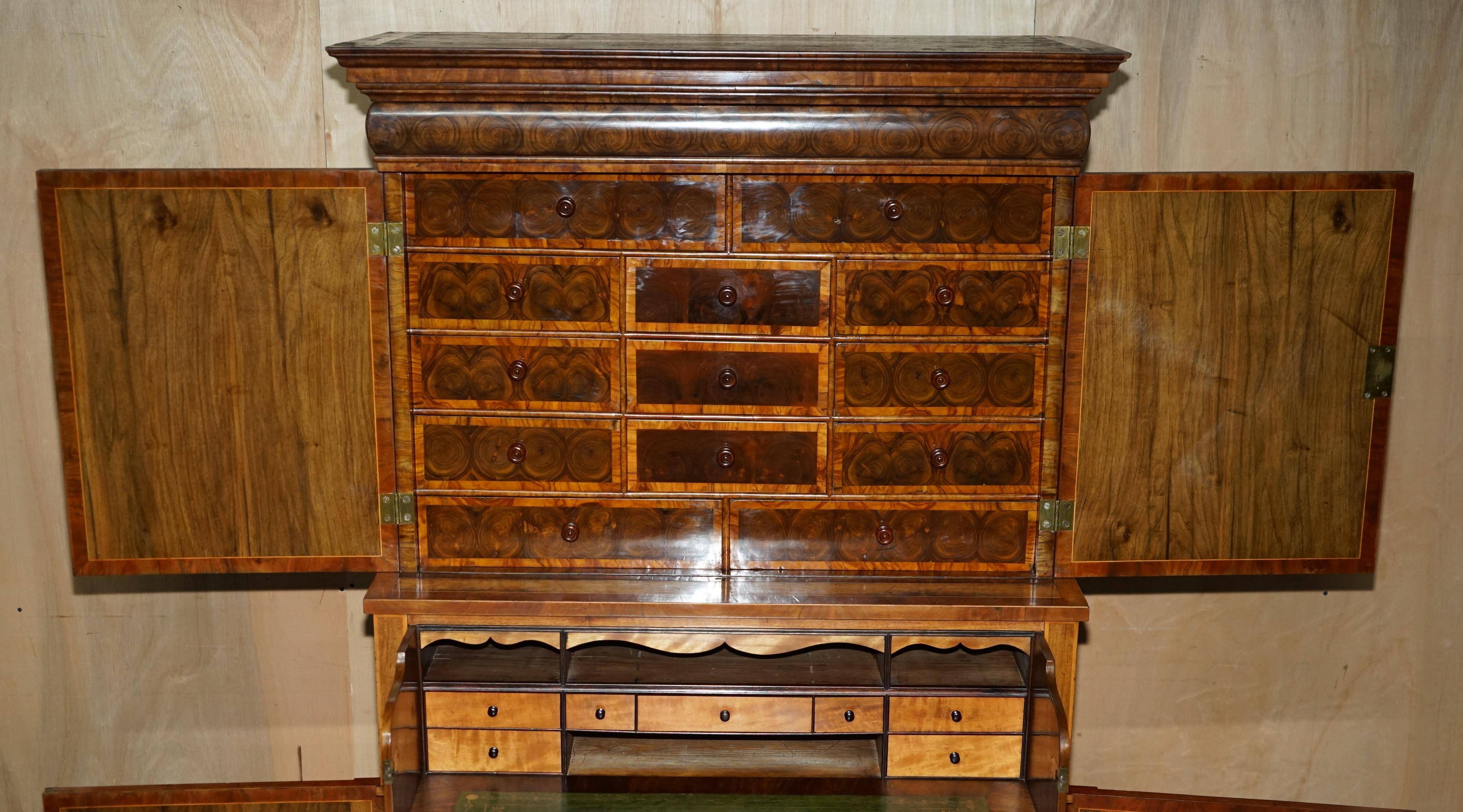 Queen Anne style pedestal commode from around 1710 in walnut and oyster veneer.