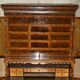 Queen Anne style pedestal commode from around 1710 in walnut and oyster veneer.