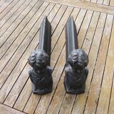 Antique cast iron fireplace andirons: bust of a garçonne
