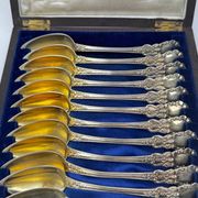 12 dessert spoons in vermeil, Minerva 19th century, blackened pear tree box