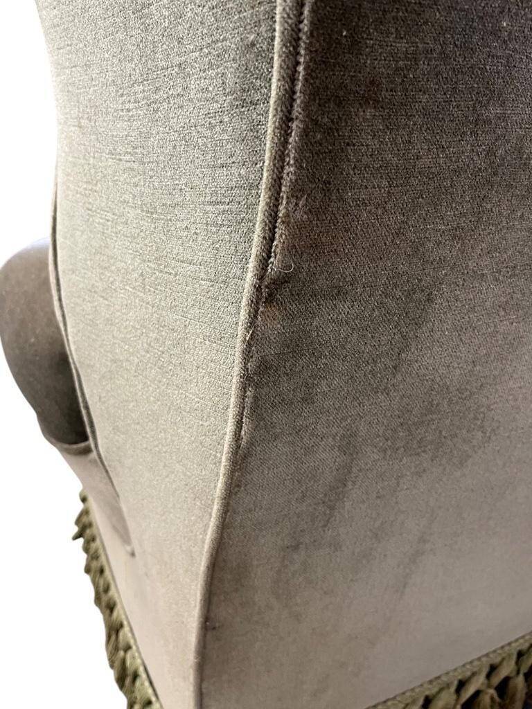 Vintage green club chair with fringes